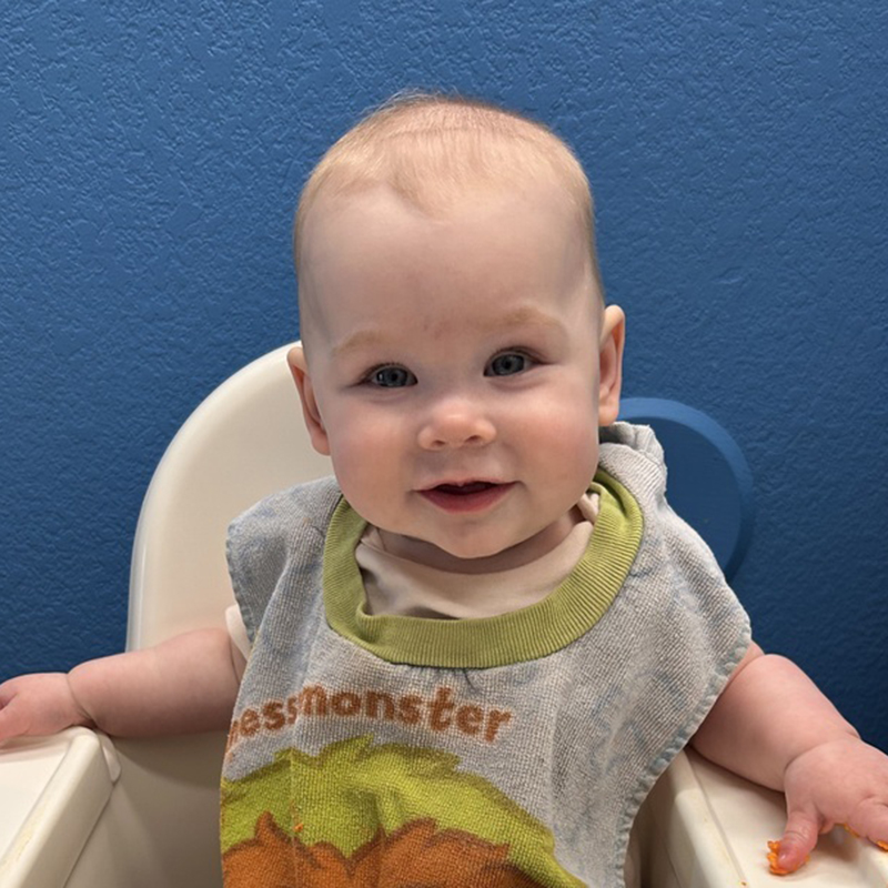 a baby in a highchair